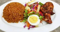 Jollof Rice with Salad and Egg