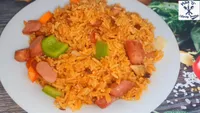 Jollof Rice with Salad& sausage