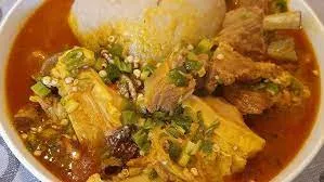 Banku with okro soup(goat meat)