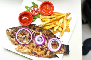 Yam chips with grilled tilapia