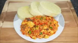 Boiled yam with egg stew