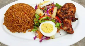 Jollof Rice with Salad and Egg